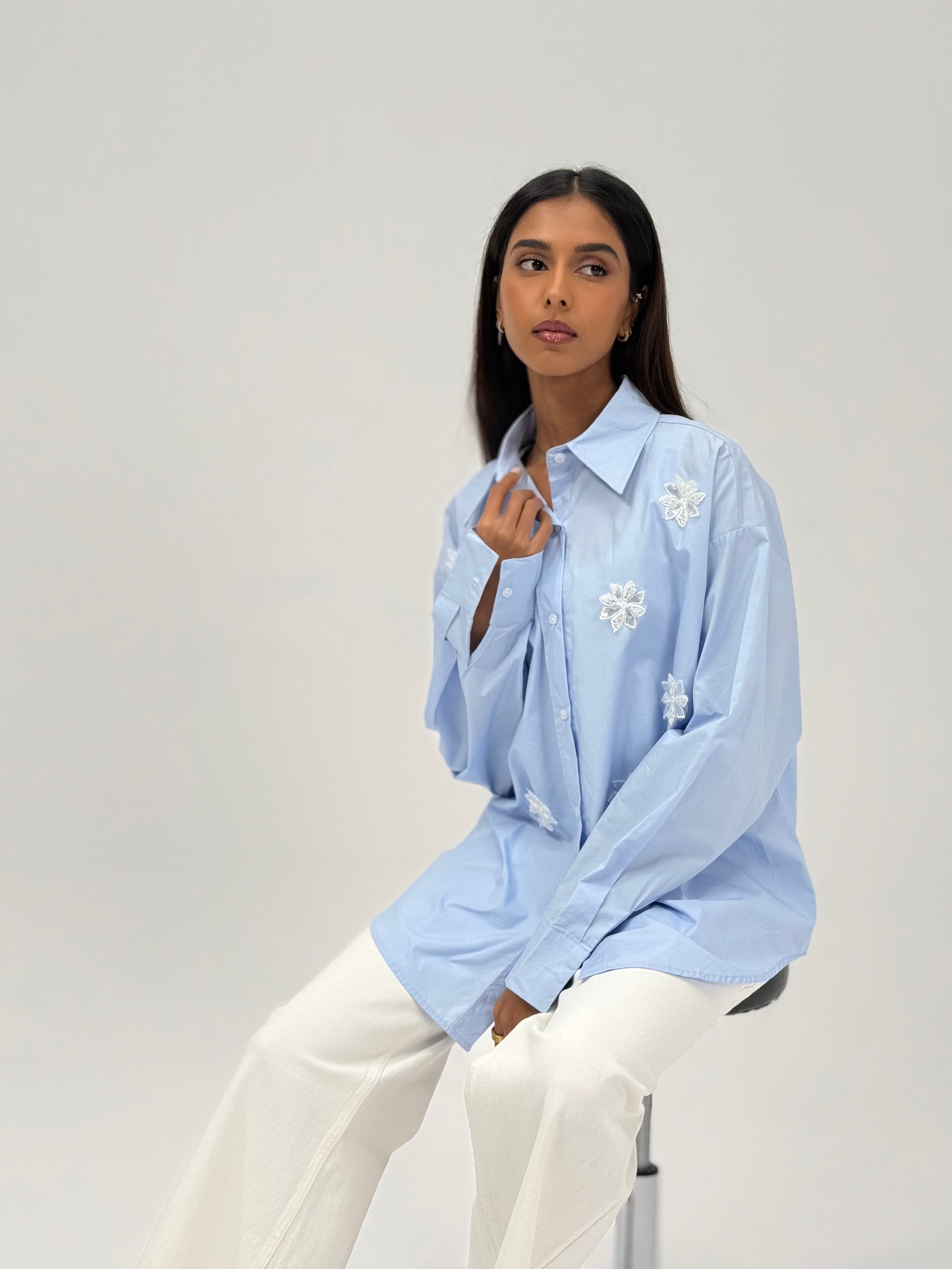 Shirt with beaded flower