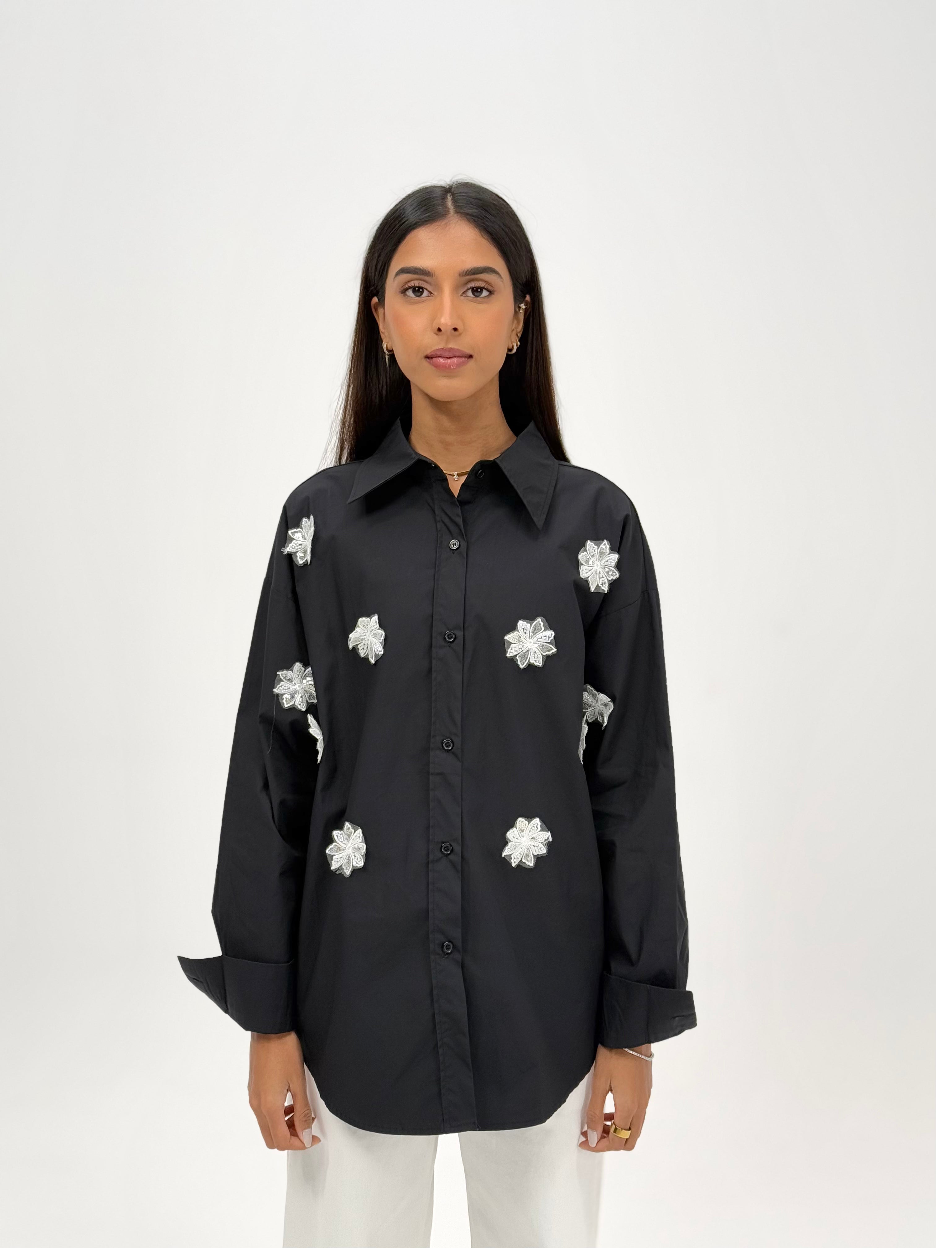 Shirt with beaded flower